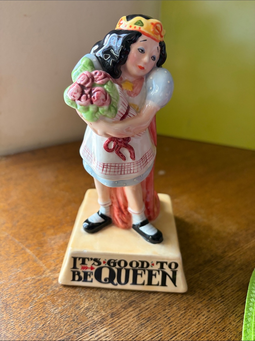 Mary Engelbreit Ceramic Queen Figurine with Pink Flowers and Black Hair